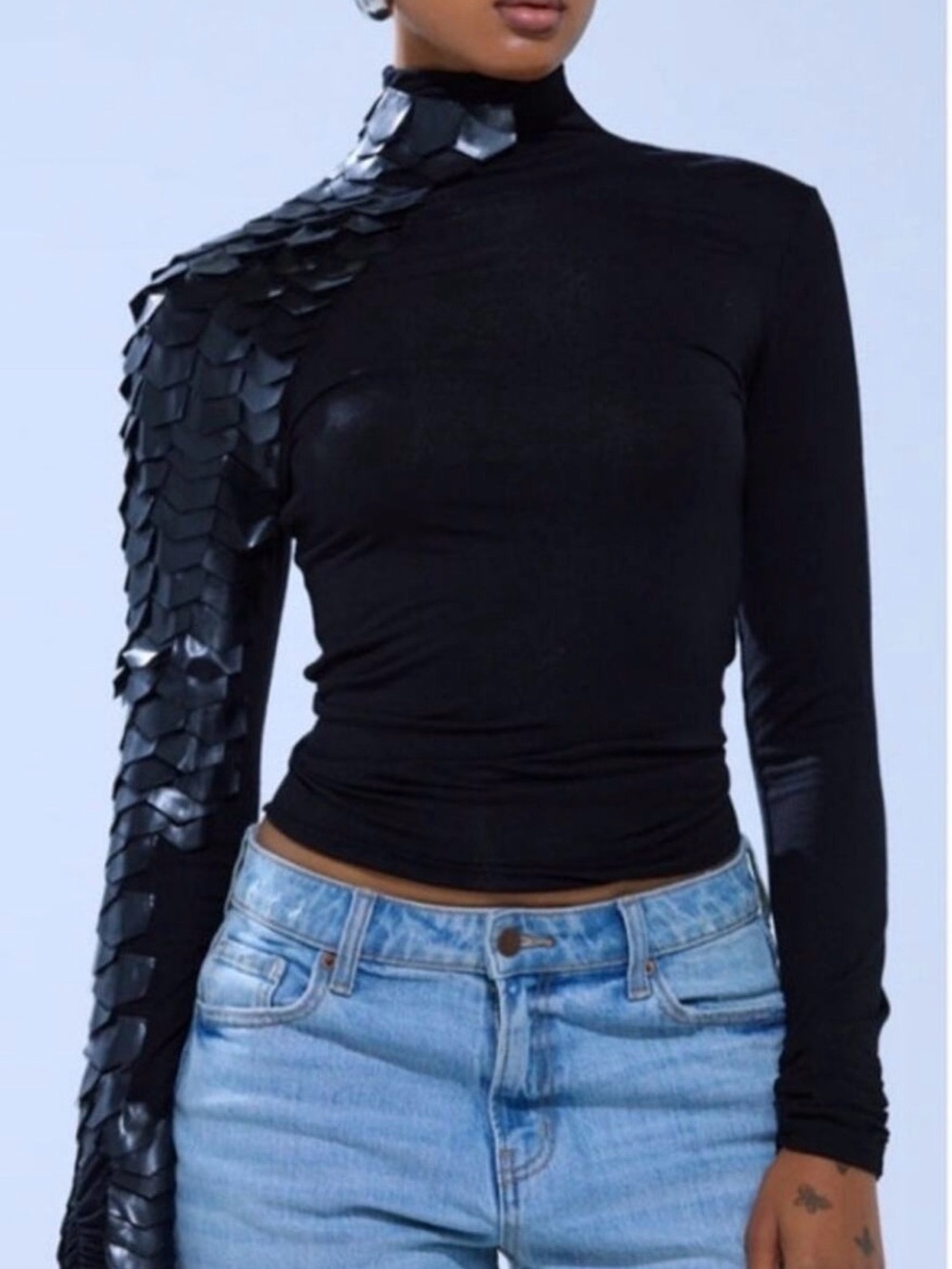 AKIRA Black Turtleneck Top with Scaled Asymmetric Sleeve